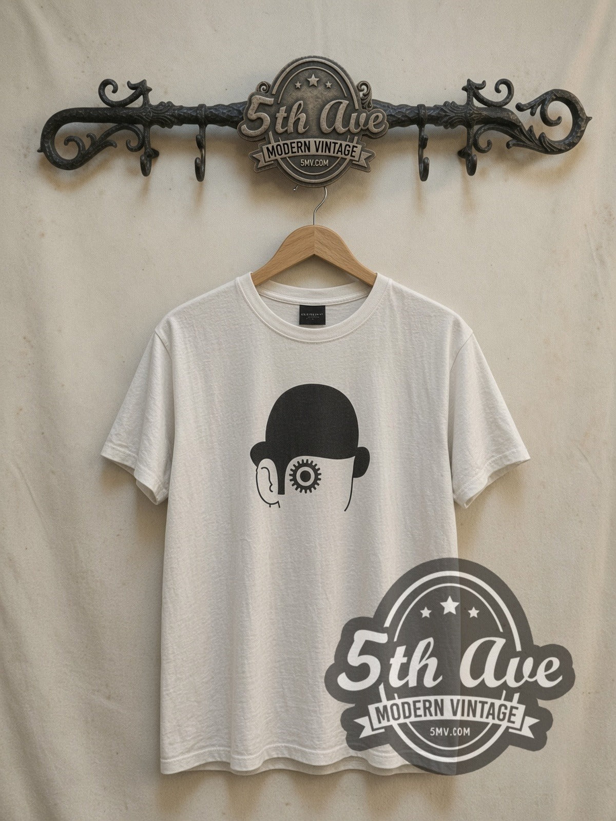 A Clockwork Orange Minimal Bowler Hat Gear Eye vintage movie t-shirt, front view on a display rack