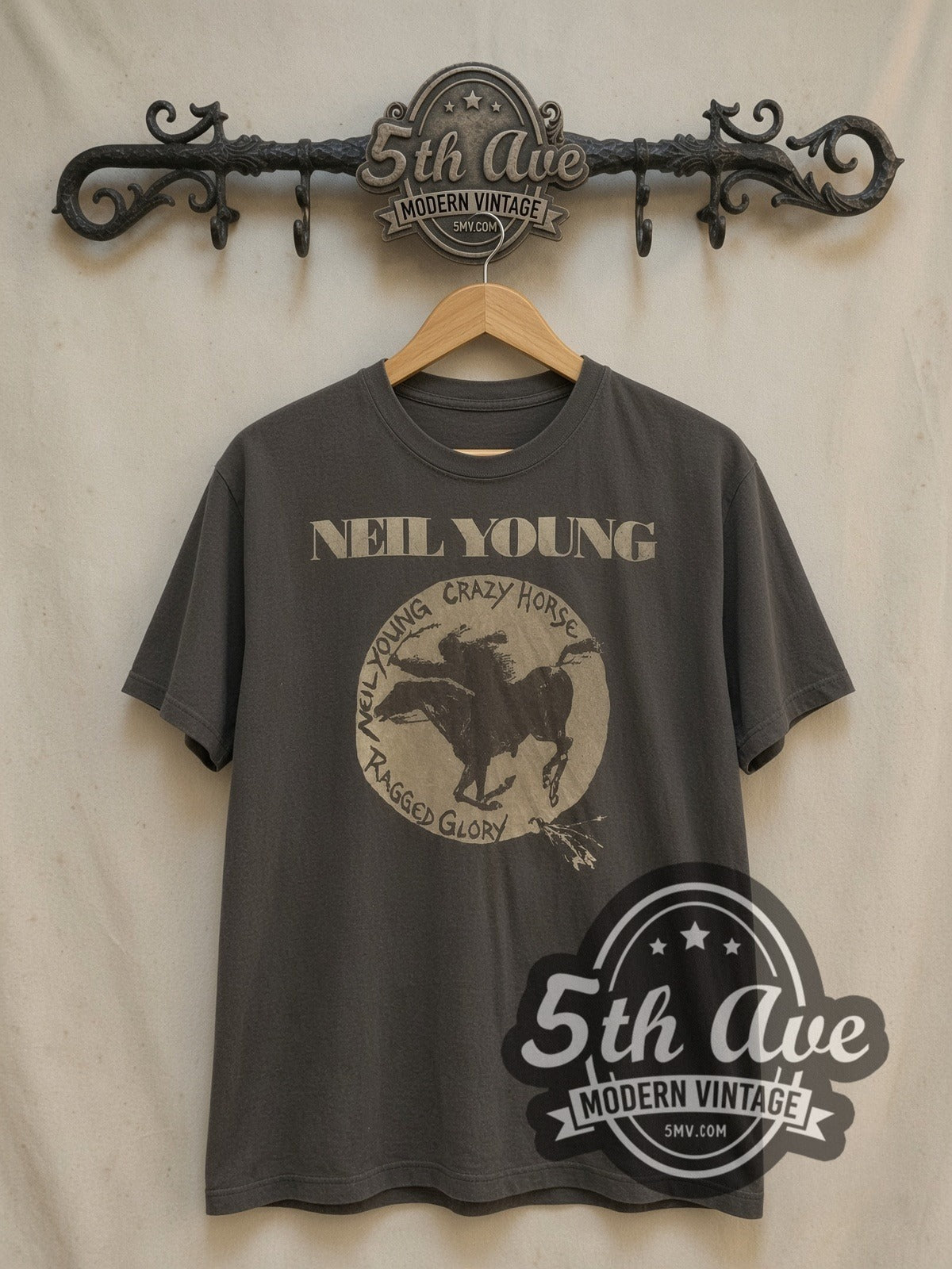 Neil Young Ragged Glory Crazy Horse Circle vintage band t-shirt, front view on a display rack