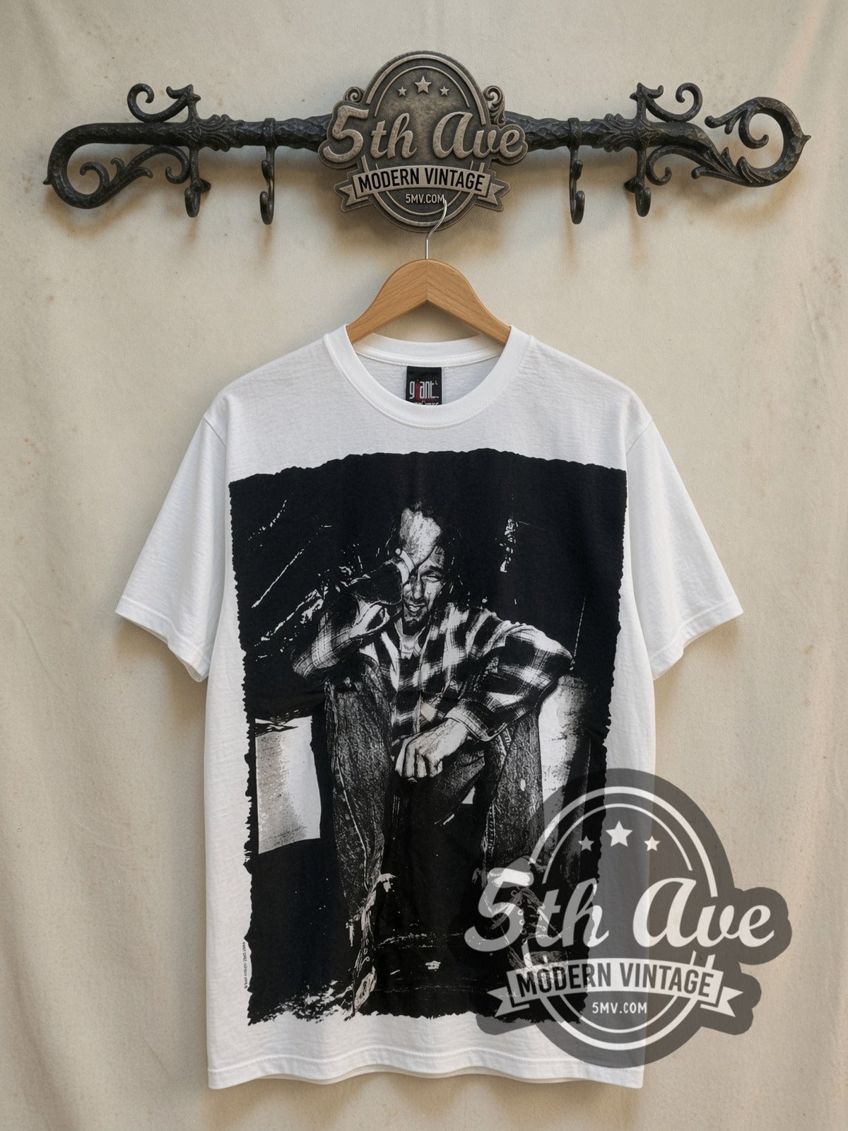 Nirvana Kurt Cobain Tribute all-over-print vintage band t-shirt, front view on the 5MV rack