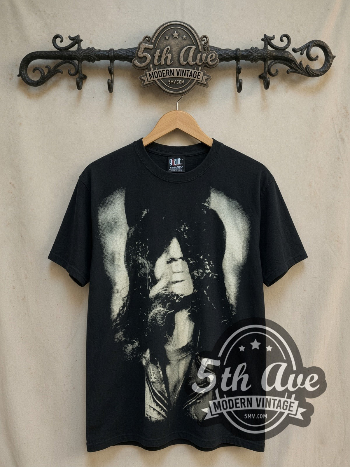Slash Portrait all-over-print vintage band t-shirt, front view on a display rack