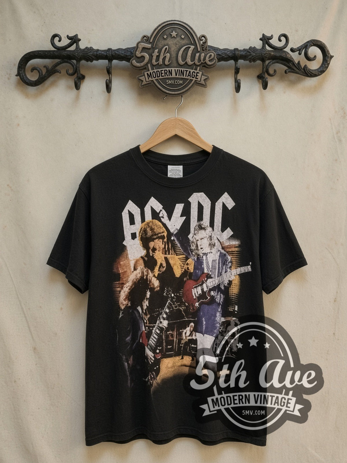 AC/DC Thunderstruck Live vintage band t-shirt, front view on a display rack