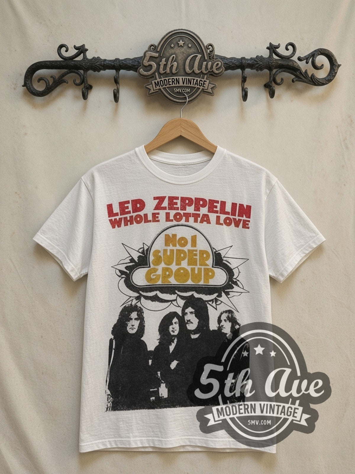 Led Zeppelin Whole Lotta Love' vintage band t-shirt in white, front view on a display rack