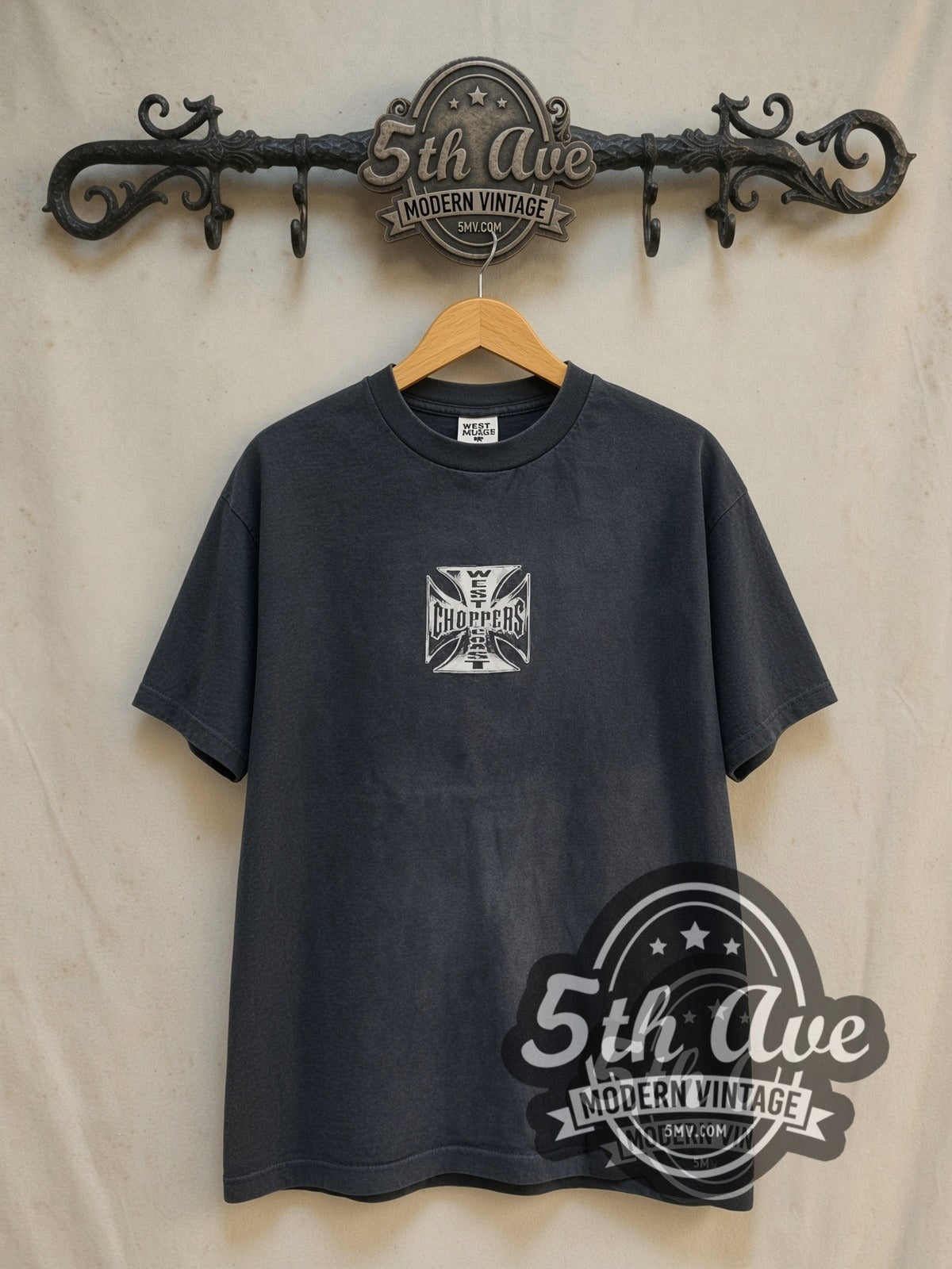 West Coast Choppers Long Beach Purple Hot Rod Iron Cross vintage biker tee in black, front view on a display rack