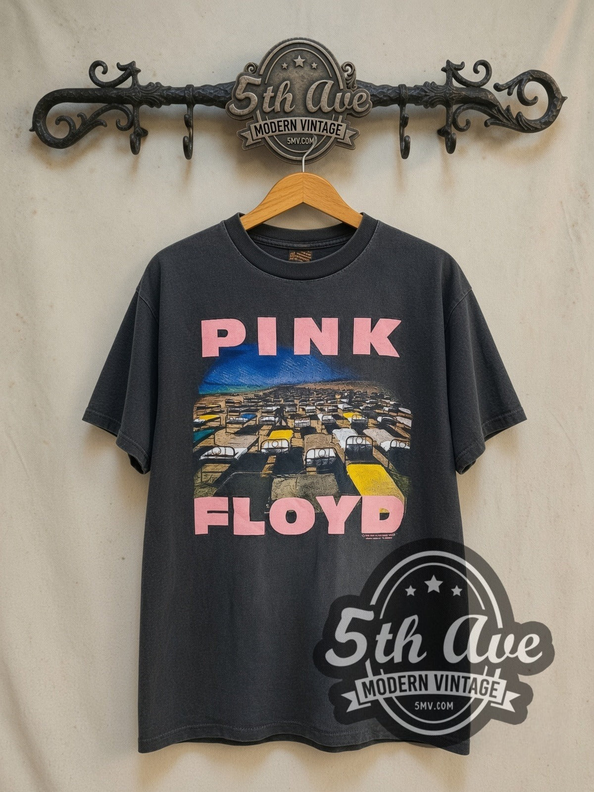 Pink Floyd A Momentary Lapse of Reason vintage band t-shirt in black, front view on a display rack