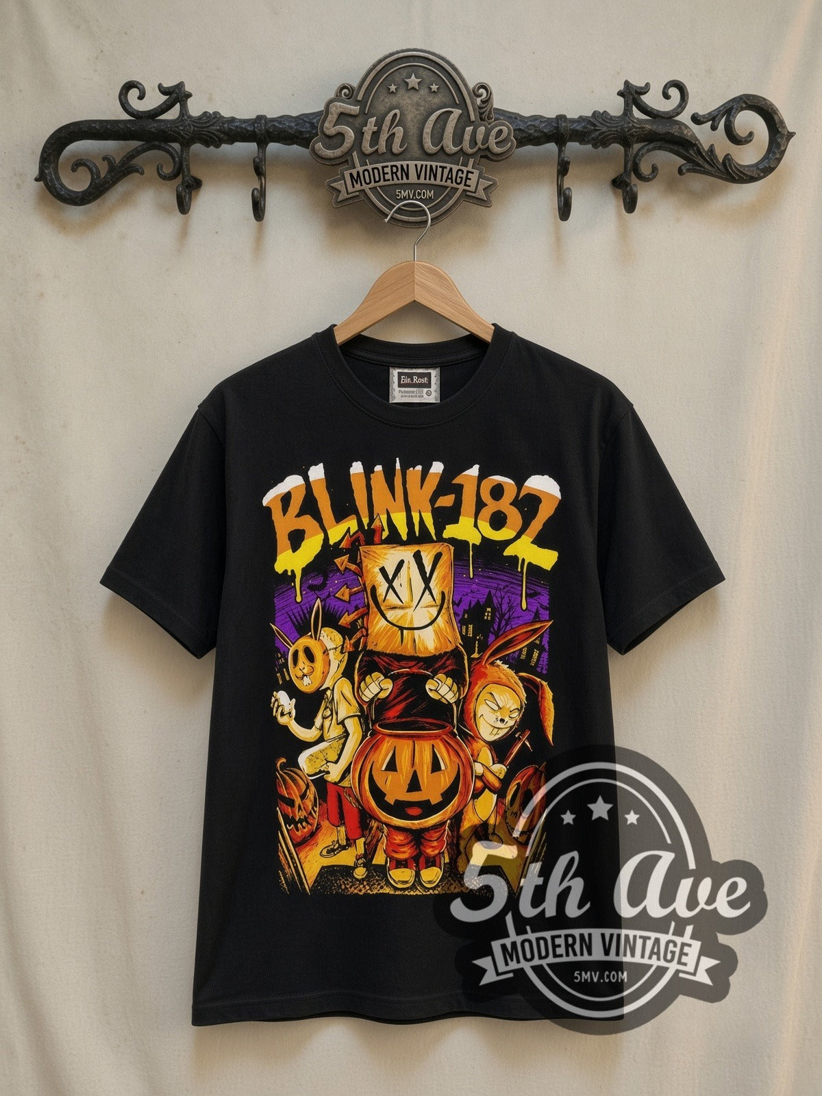 Blink-182 Halloween Pumpkin vintage band t-shirt in black, front view on a display rack
