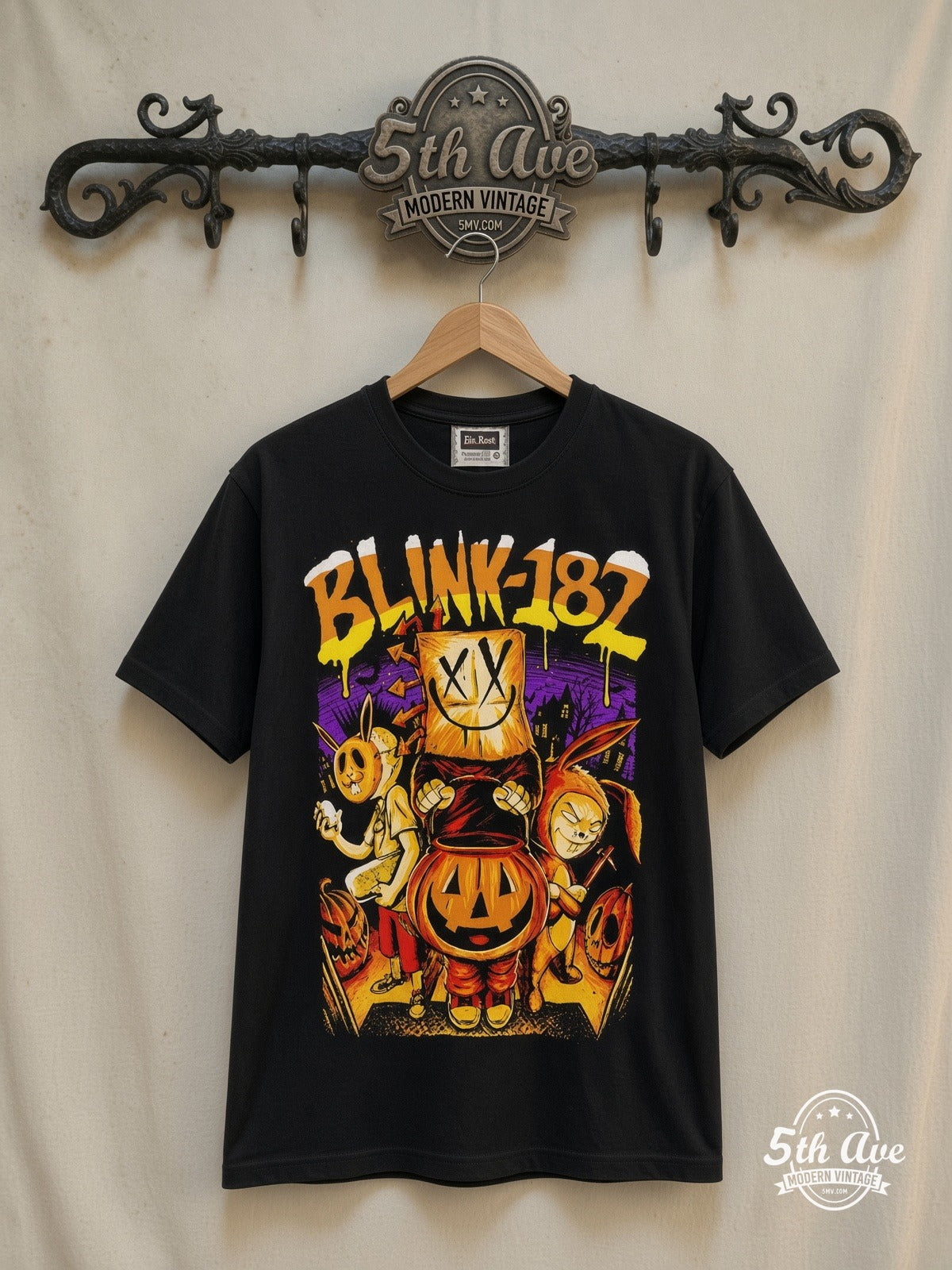 Blink-182 – Halloween Pumpkin – Vintage Band T-Shirt — front on locked cream ornate 5th Ave rack