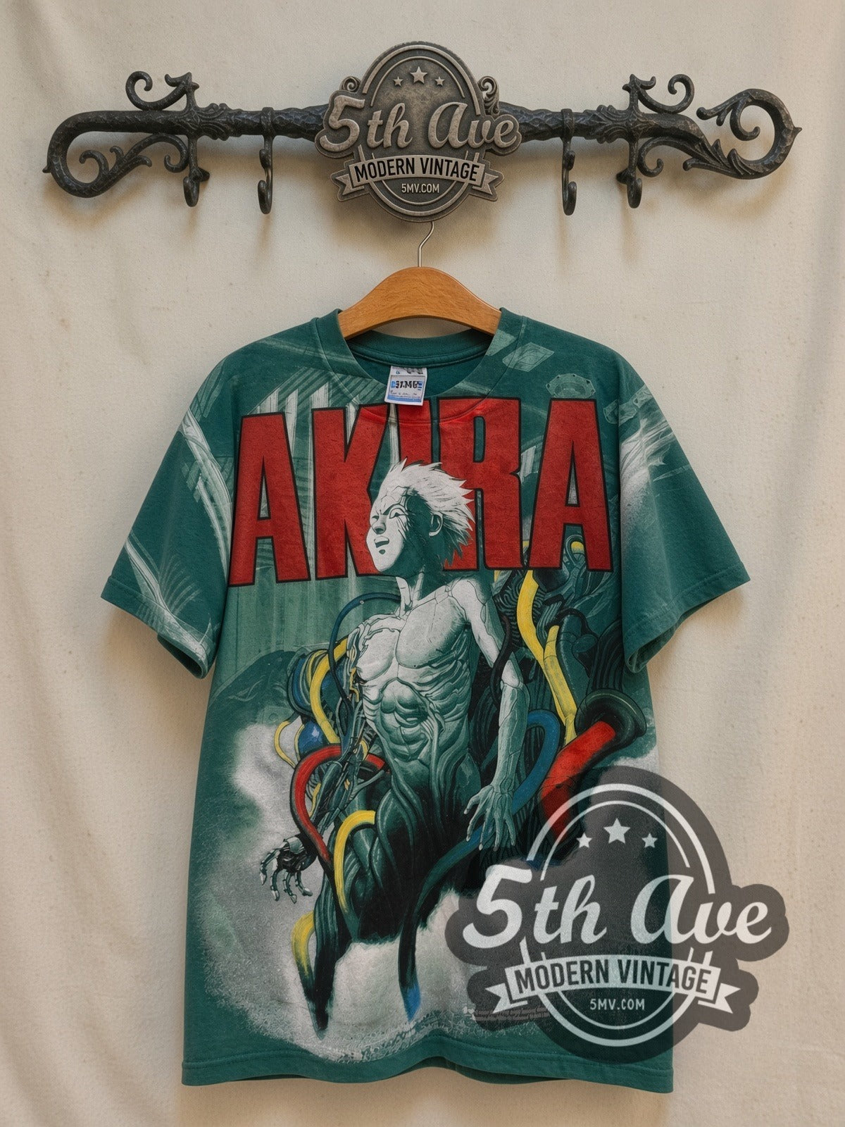 Akira Tetsuo Shima all-over-print vintage graphic t-shirt, front view on a display rack