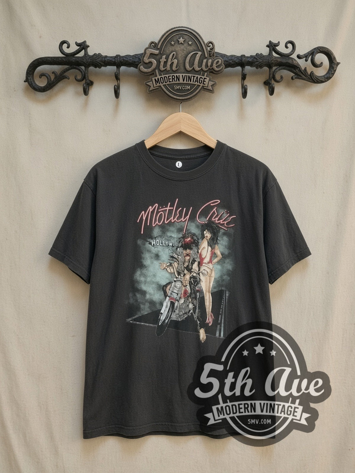 Mötley Crüe Motorcycle Graphic vintage band t-shirt, front view on a display rack