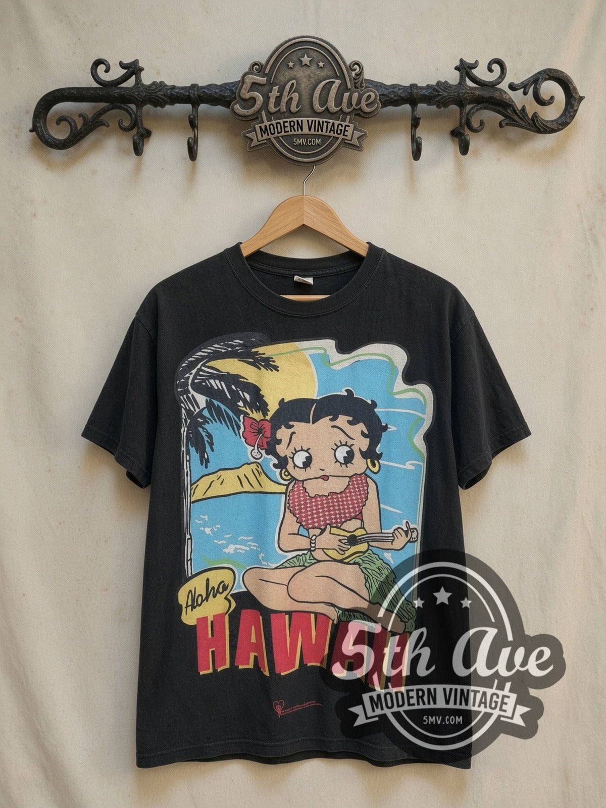 Betty Boop Aloha Hawaii Polynesian Princess vintage cartoon tee, front view on a display rack