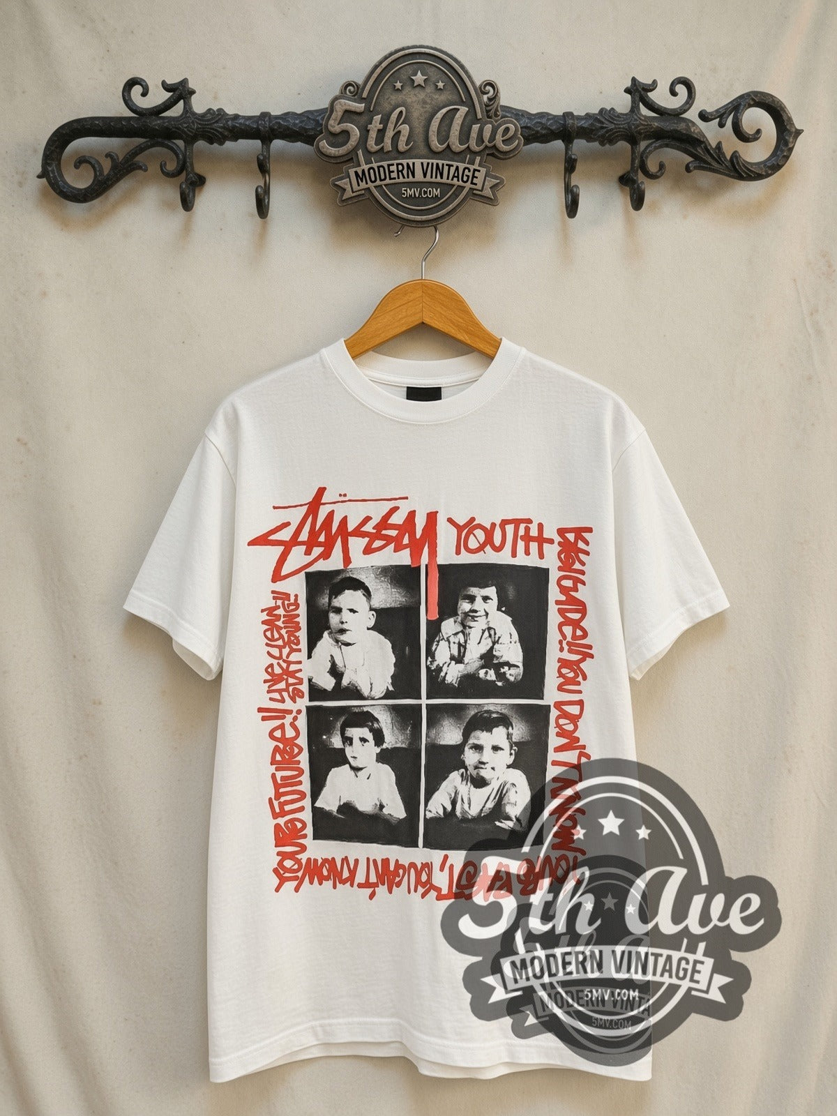 Youth Brigade x Stüssy Live Clean Stay Young vintage band t-shirt in white, front view on a display rack