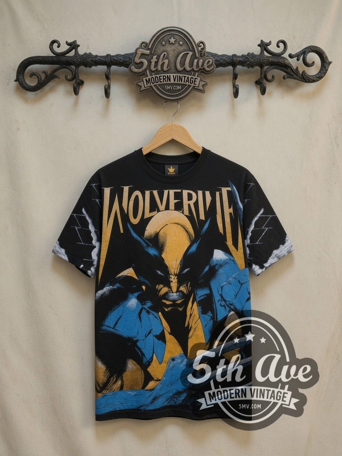 Wolverine all-over-print vintage movie tee, front view on a display rack