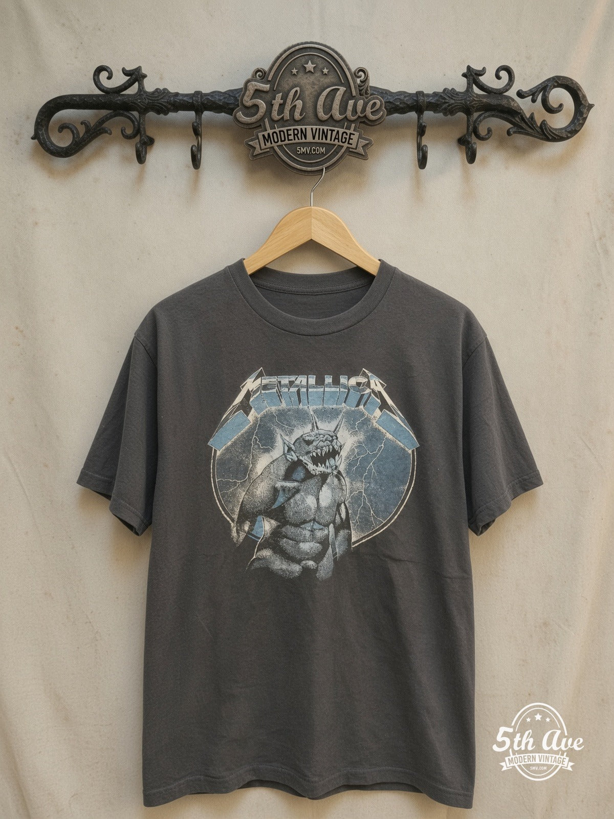 Metallica – Ride the Lightning' Monster Beast and Electric Chair Cotton – Vintage Band T-Shirt — front on locked cream ornate 5th Ave rack