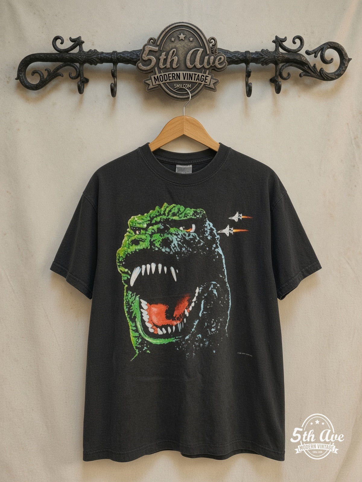 Godzilla King of the Monsters 1994 movie tee in black, front view on a display rack