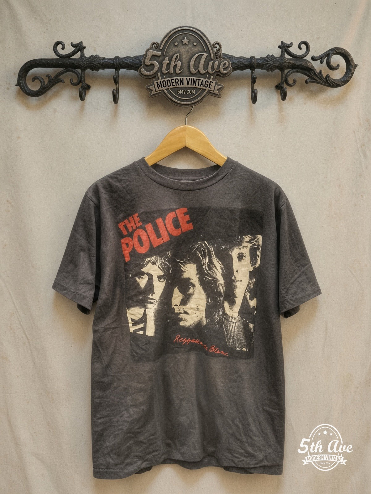 Pink Floyd – THE POLICE – Vintage Band T-Shirt — front on locked cream ornate 5th Ave rack