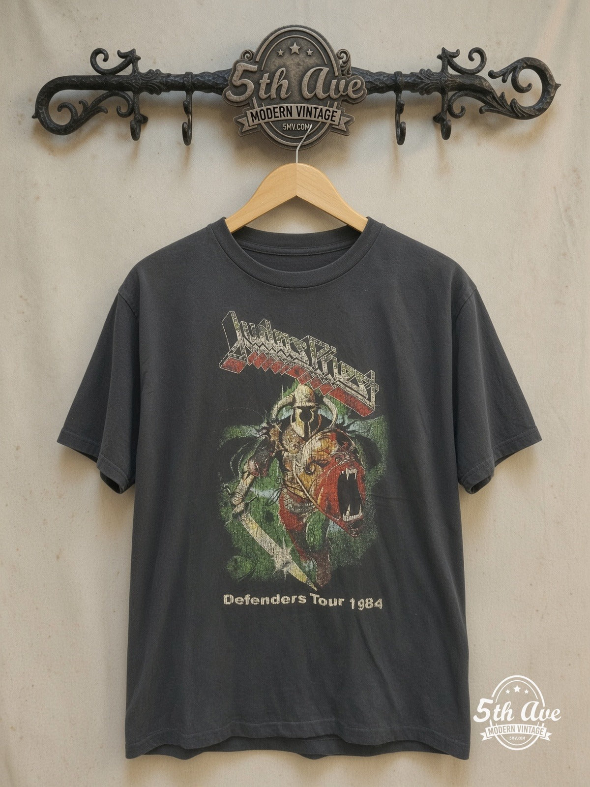 Judas Priest – Defenders Tour 1984 – Vintage Band T-Shirt — front on locked cream ornate 5th Ave rack
