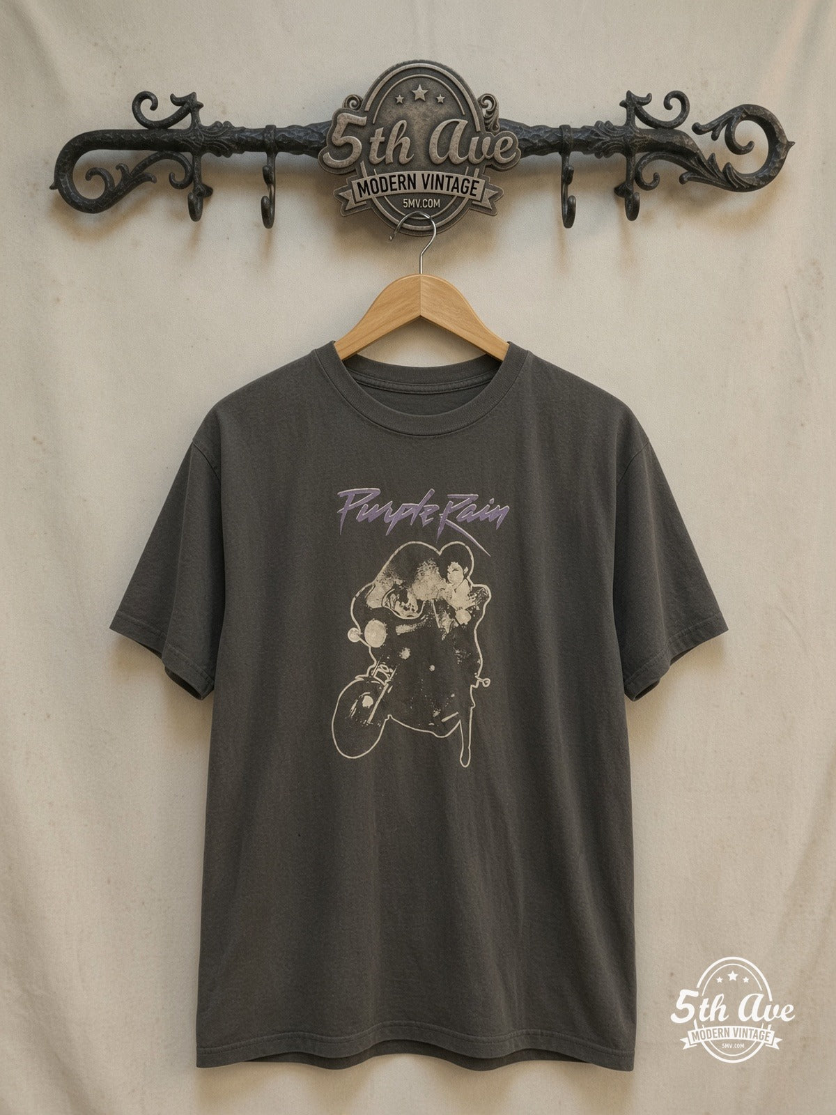 Prince – Purple Rain Script Motorcycle – Vintage Band T-Shirt — front on locked cream ornate 5th Ave rack