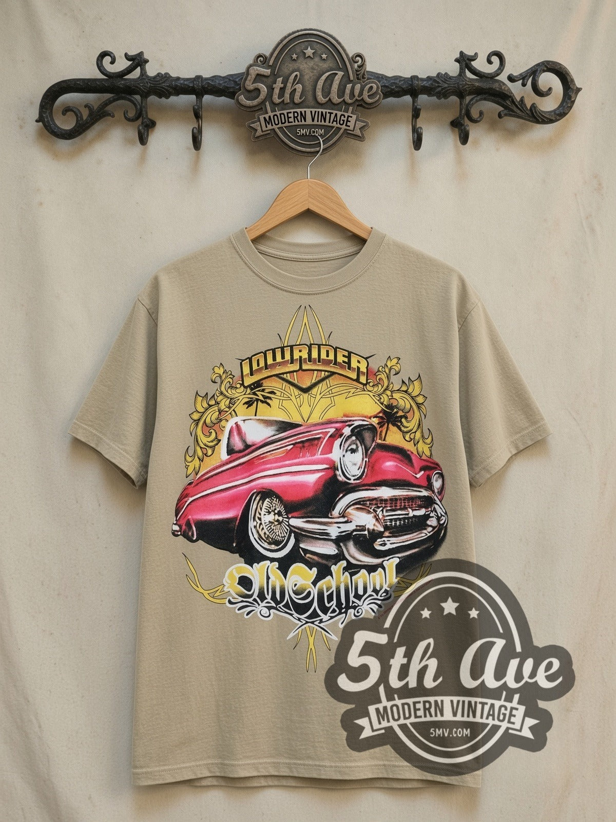 Rollin Hard Old School Lowrider vintage graphic tee, front view on a display rack