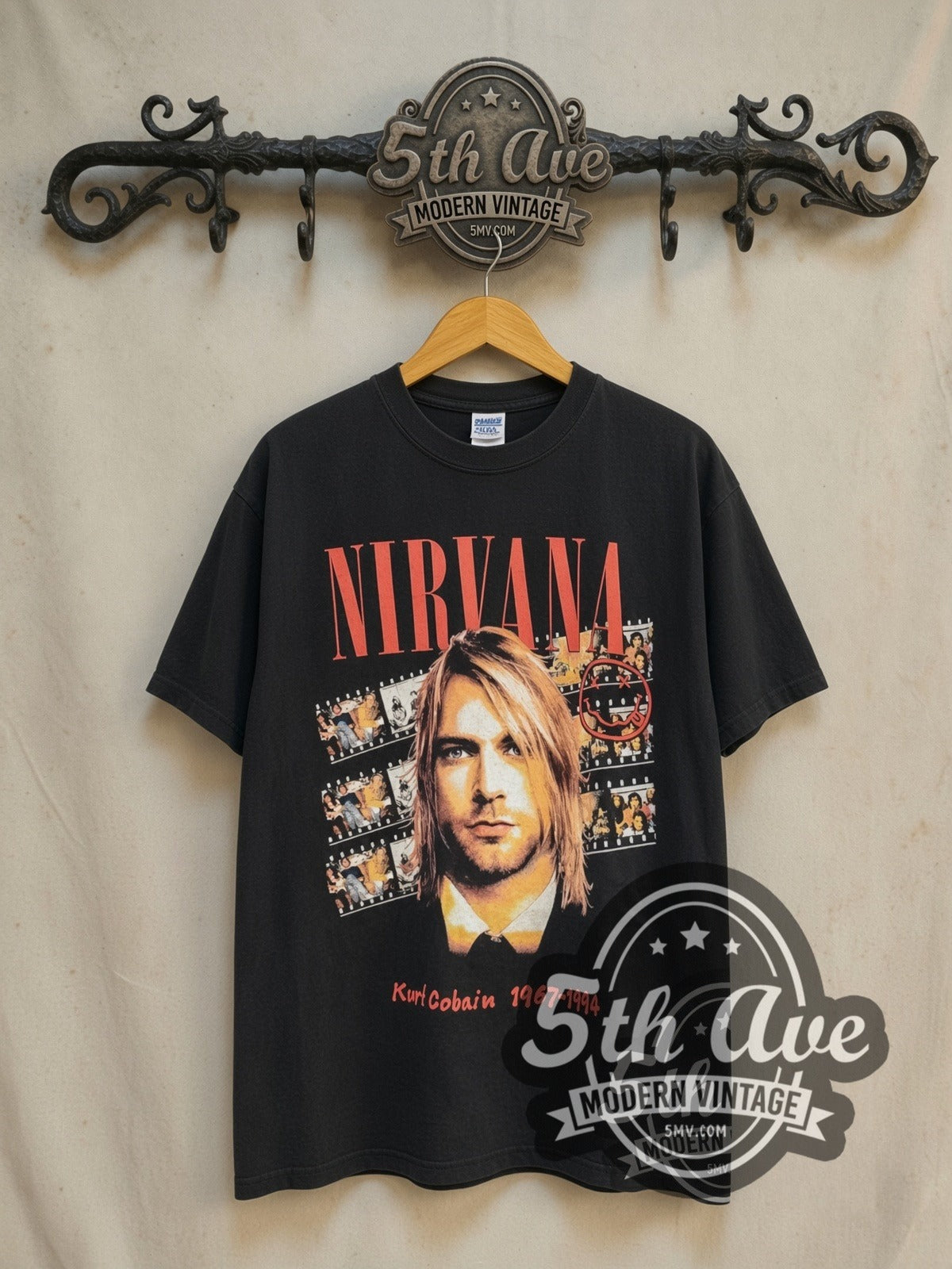 Nirvana Kurt Cobain Filmstrip Red Logo Tribute vintage band t-shirt in black, front view on the 5MV rack