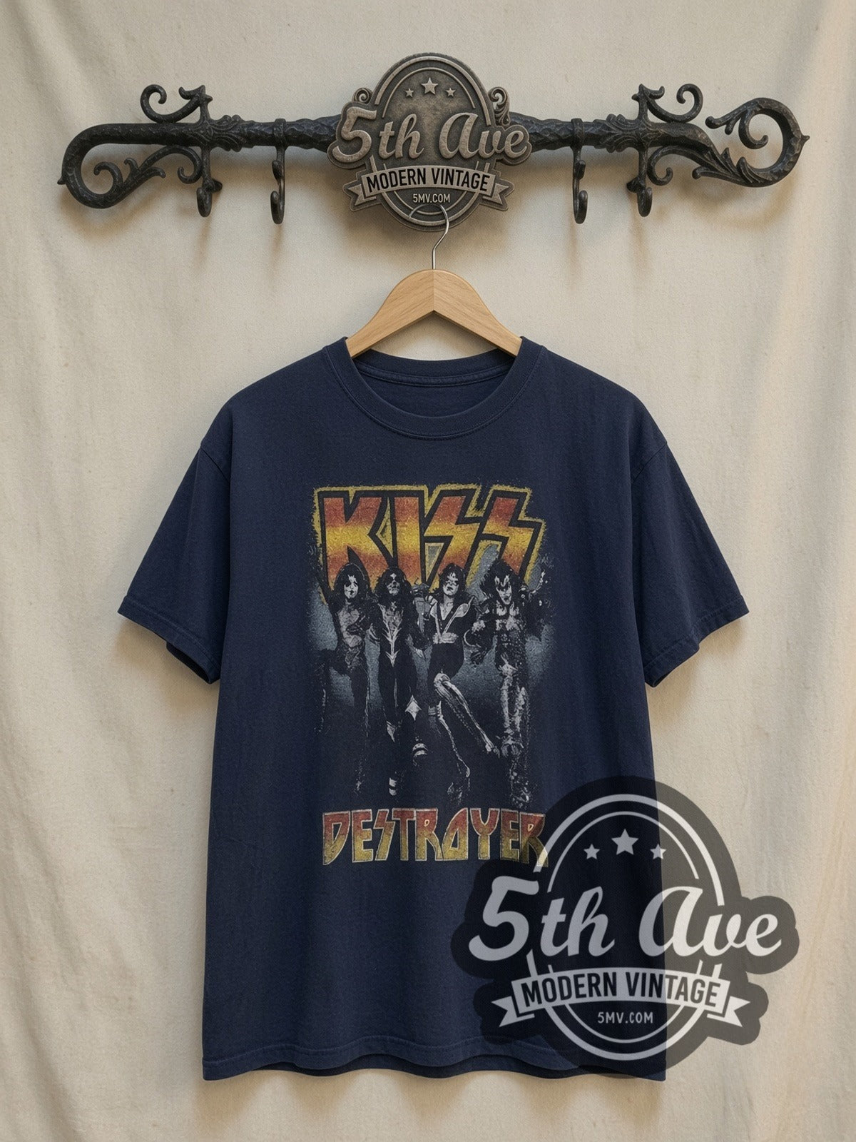 KISS Destroyer vintage band t-shirt, front view on a display rack