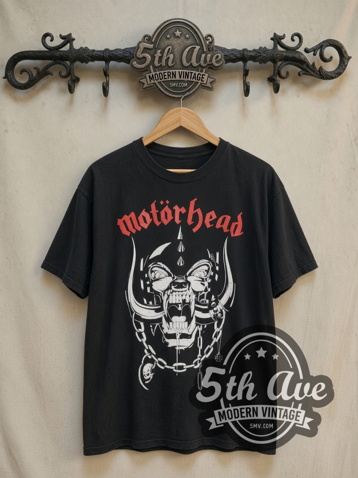 Motörhead Snaggletooth Red Logo and Chains vintage band t-shirt, front view on a display rack