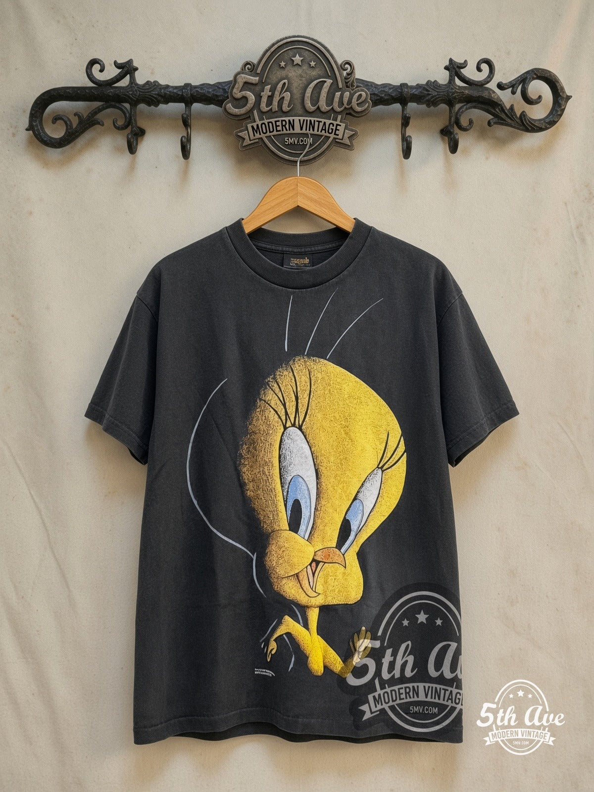Looney Tunes – Tweety – New Vintage Graphic Tee — front on locked cream ornate 5th Ave rack