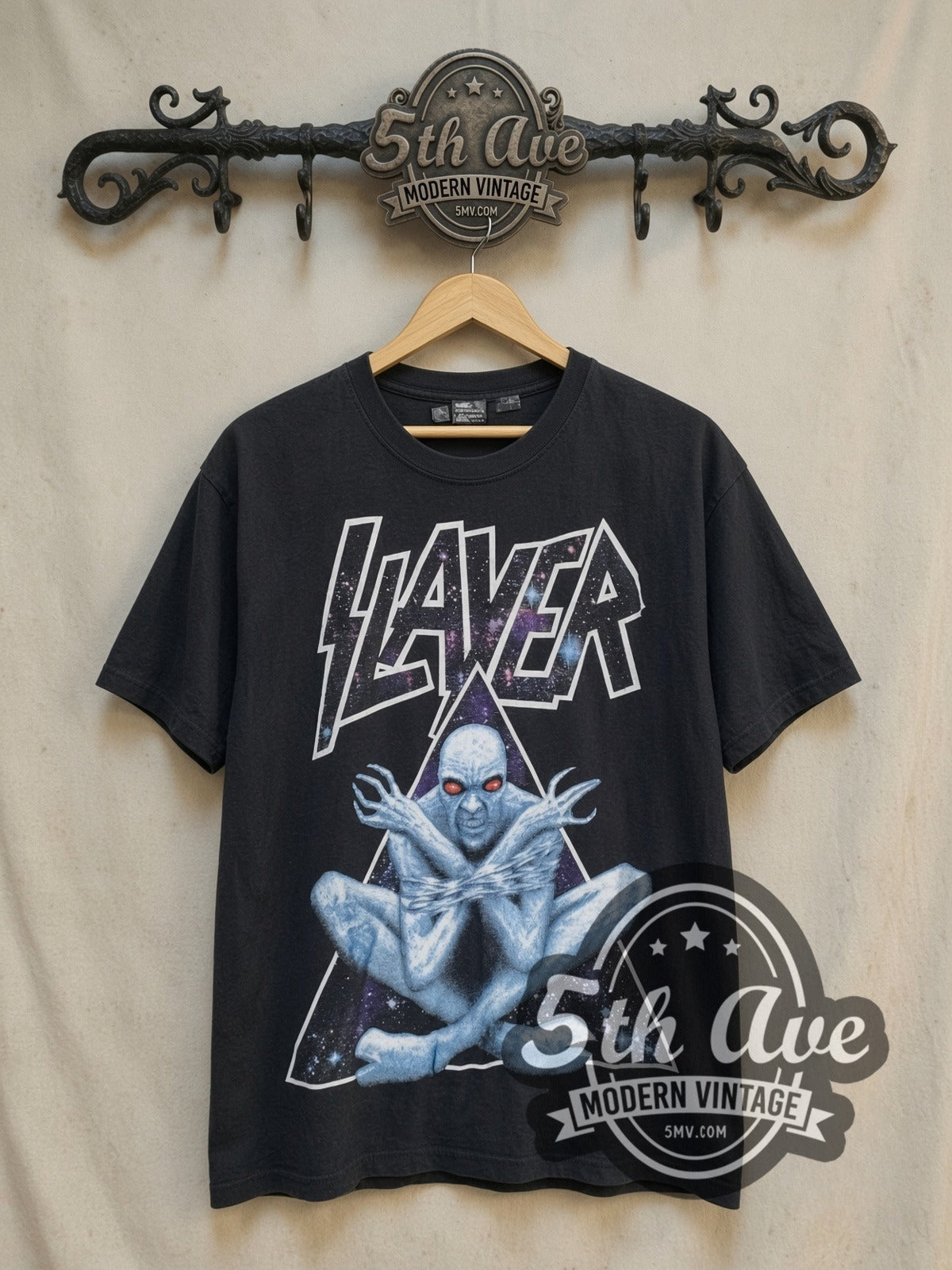 Slayer Divine Intervention Bound Monster Triangle vintage band t-shirt, front view on a display rack
