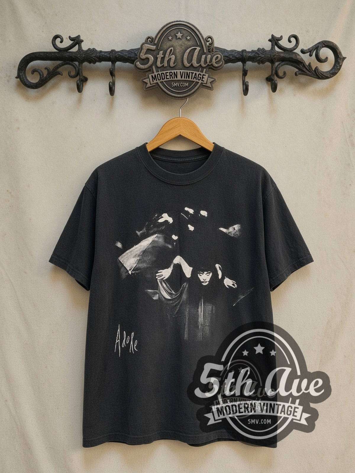 The Smashing Pumpkins Adore vintage band t-shirt in black, front view on a display rack