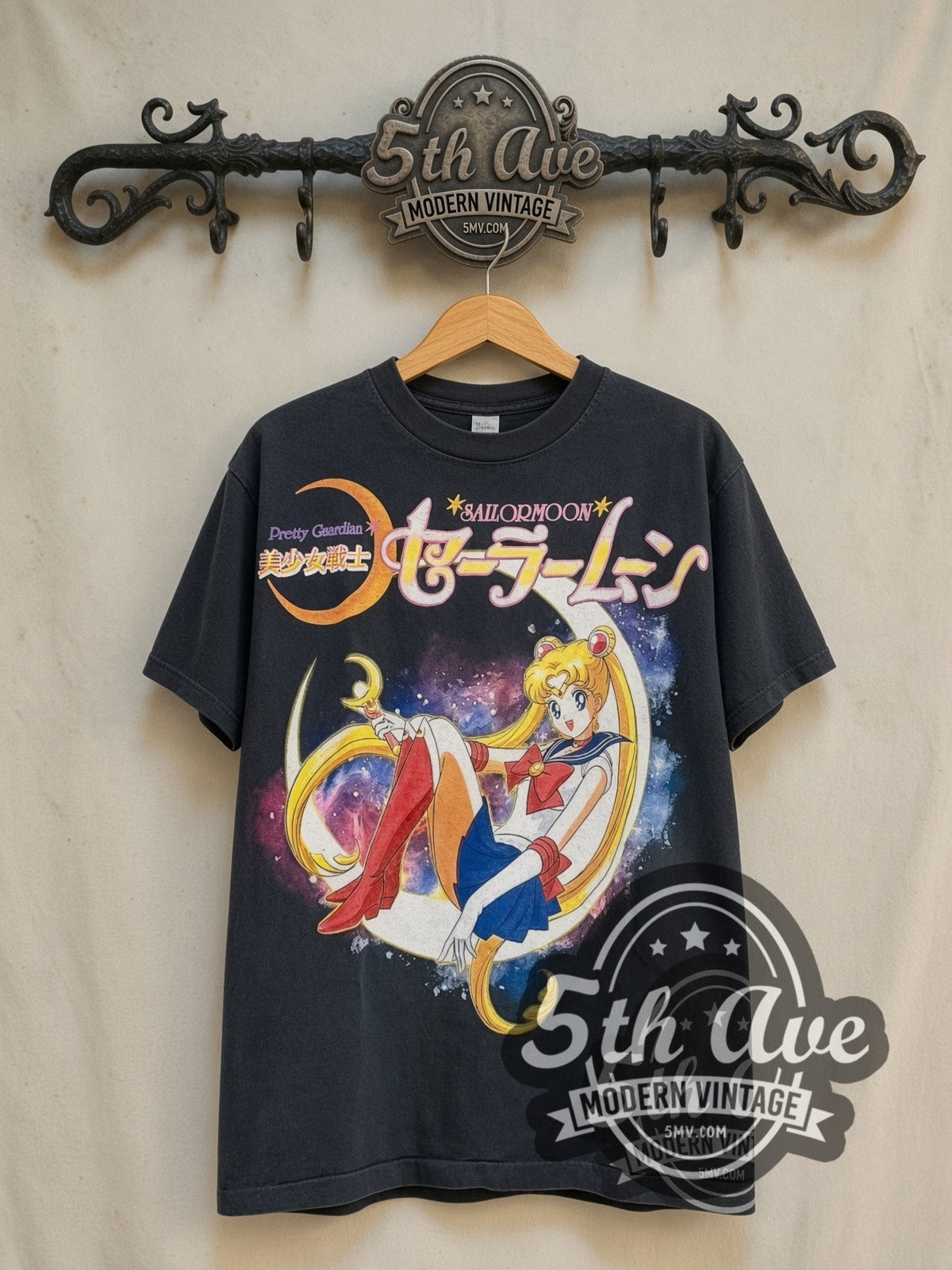 Sailor Moon Eight Sailor Guardians vintage graphic t-shirt, front view on a display rack