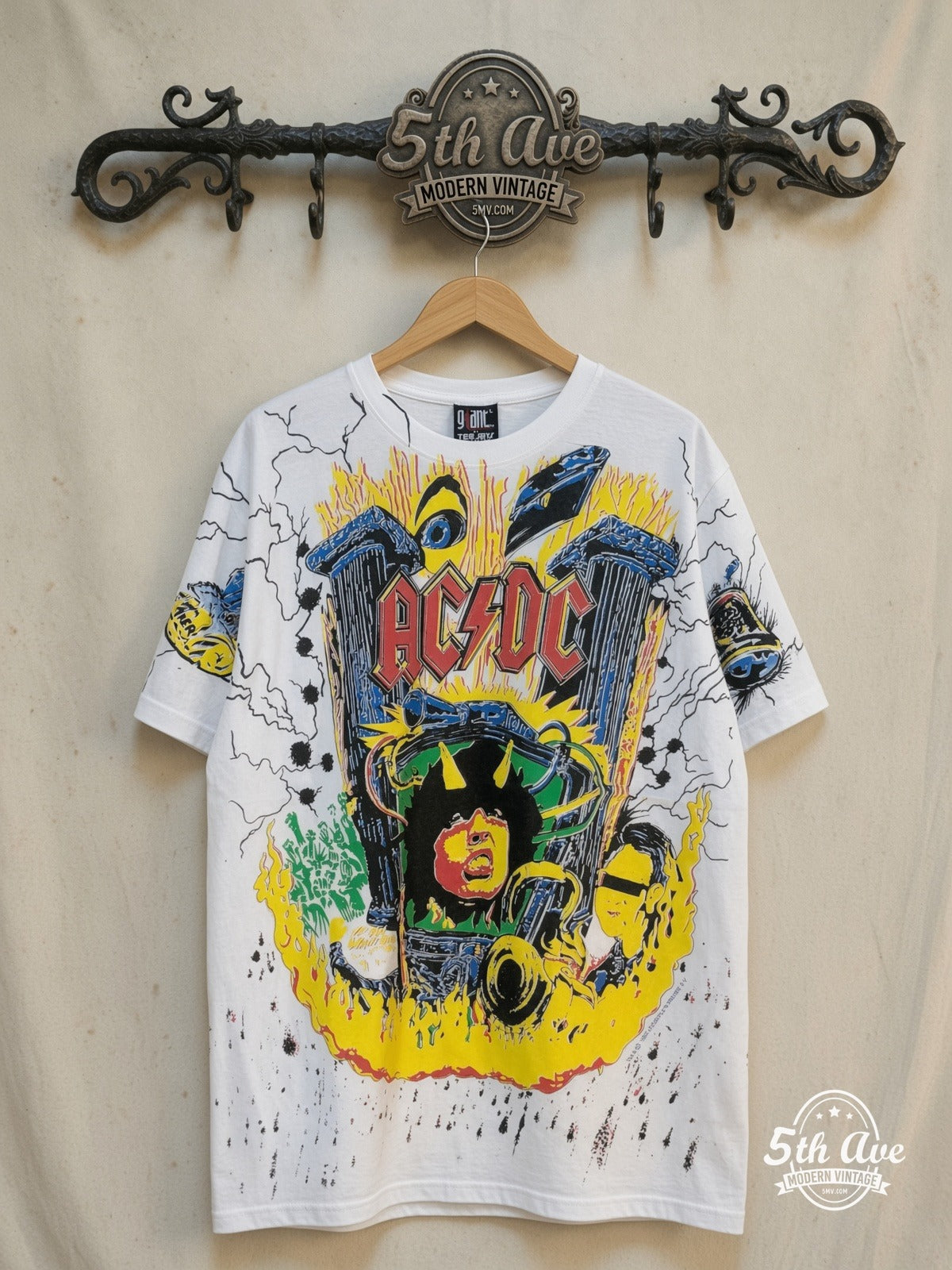 AC/DC – High Voltage Harmony – All Over Print – Vintage Band T-Shirt — front on locked cream ornate 5th Ave rack