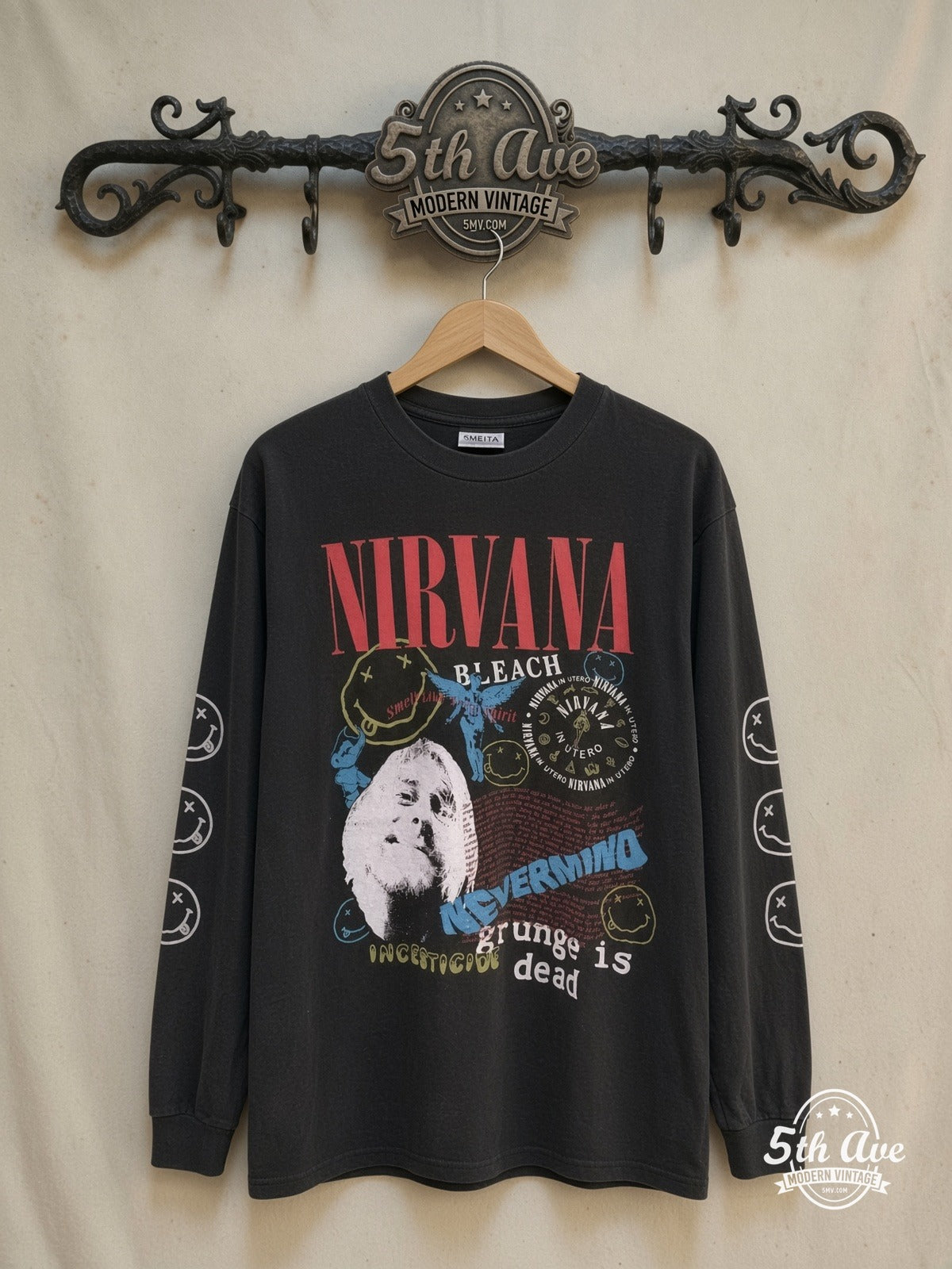 Nirvana Album Collage vintage band t-shirt, front view on a display rack
