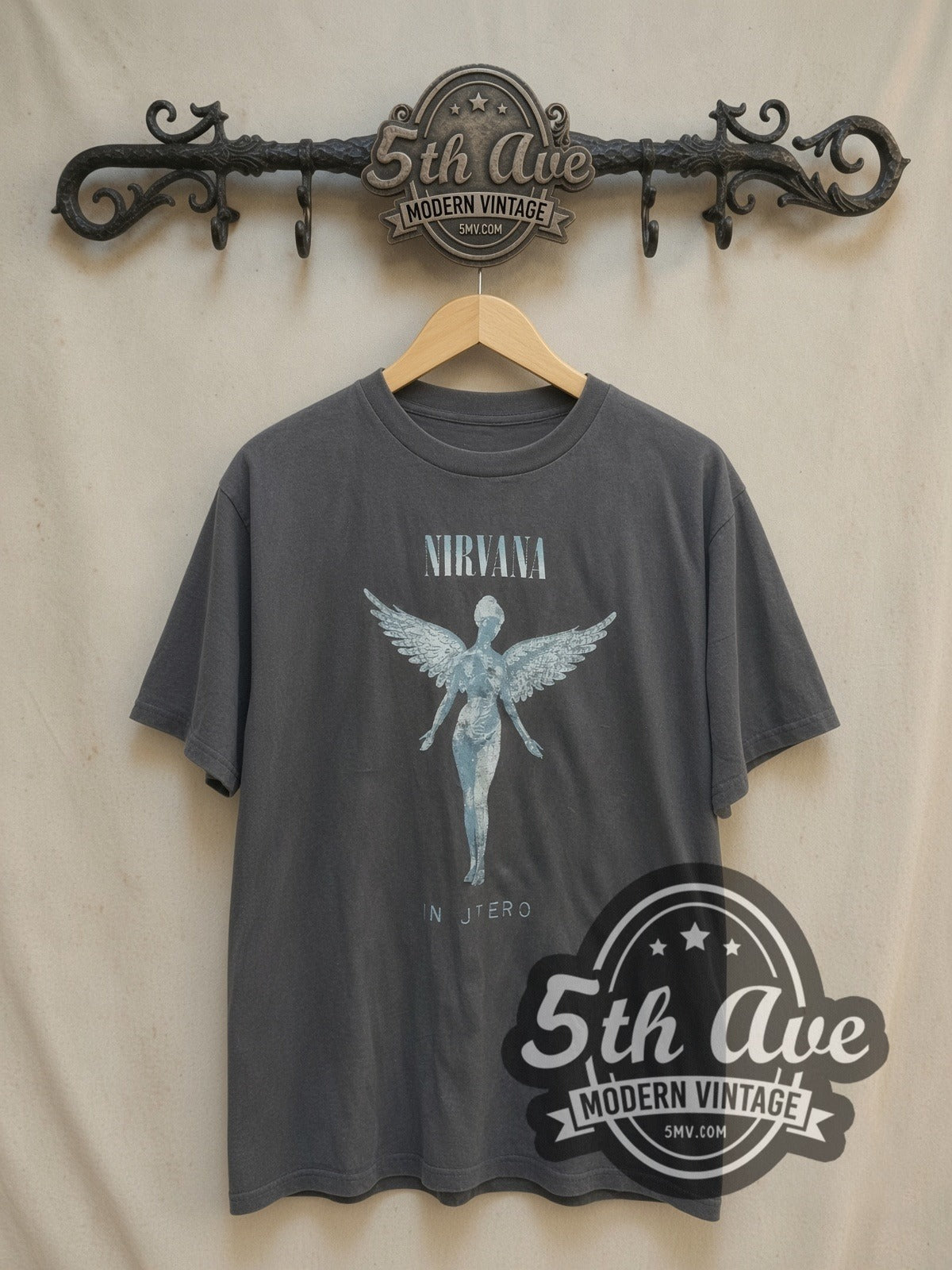 Nirvana In Utero Anatomical Angel vintage band t-shirt, front view on a display rack