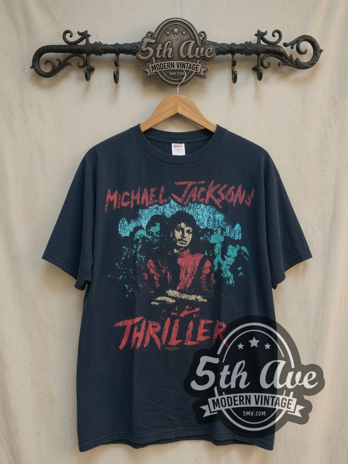 Michael Jackson Thriller vintage band t-shirt, front view on a display rack