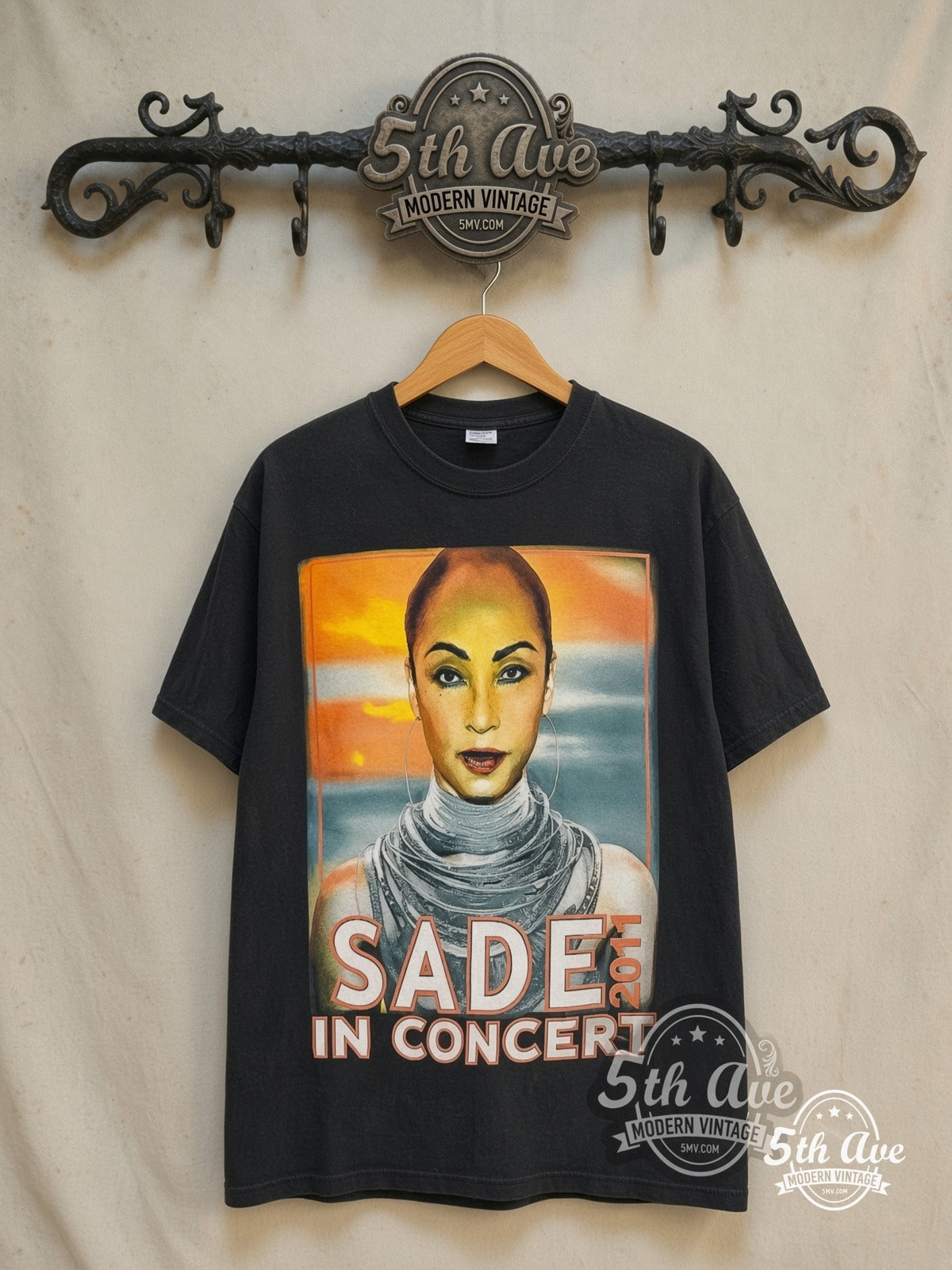 Sade – Live in Concert 2011 – Vintage Band T-Shirt — front on locked cream ornate 5th Ave rack