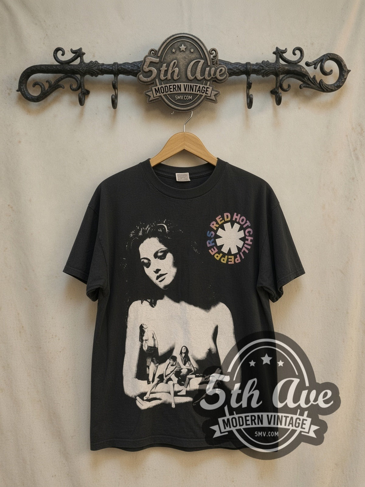 Red Hot Chili Peppers 1990 European Tour Great Expectorations vintage band t-shirt, front view on a display rack