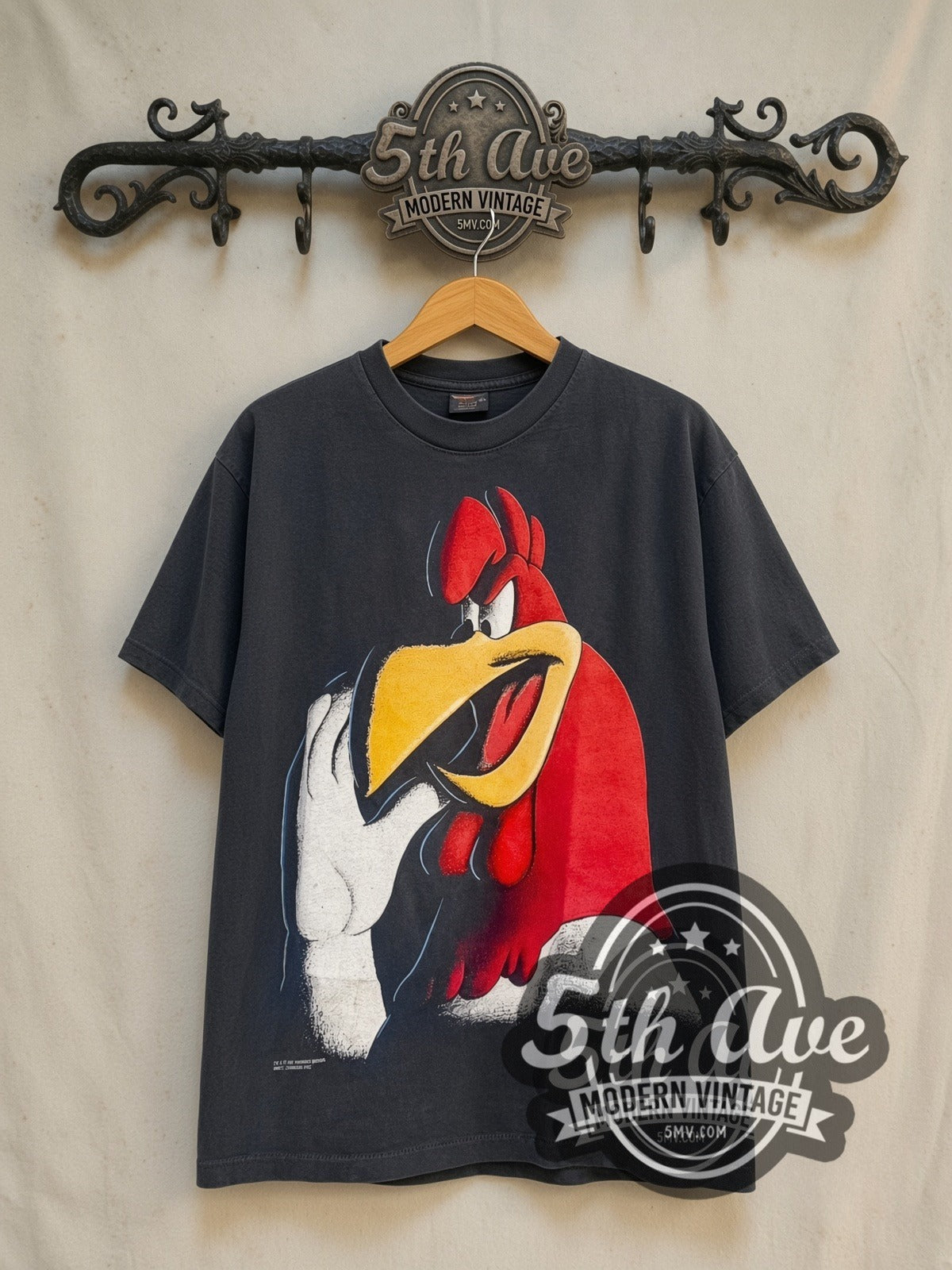 Looney Tunes Foghorn Leghorn vintage cartoon tee in black, front view on a display rack