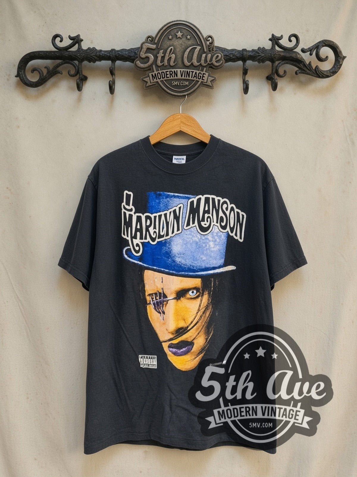 Marilyn Manson Dope Hat vintage band t-shirt in black, front view on a display rack