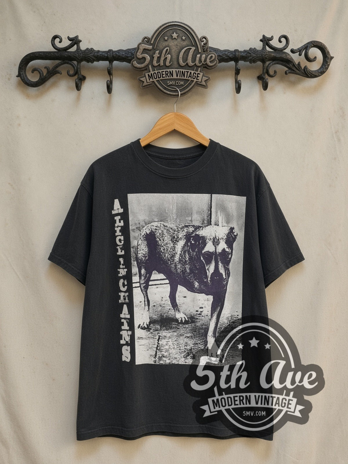 Alice in Chains Grind / Sunshine the Three-Legged Dog vintage band t-shirt in black, front view on a display rack