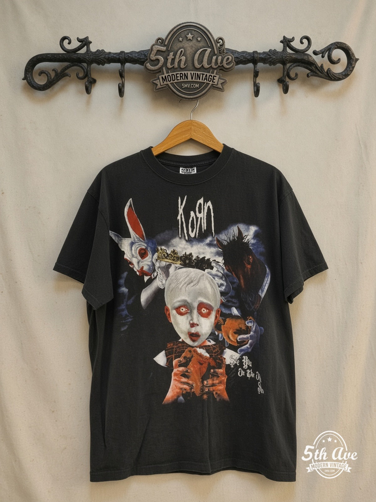 Korn – Tour 2006 – Vintage Band T-Shirt — front on locked cream ornate 5th Ave rack