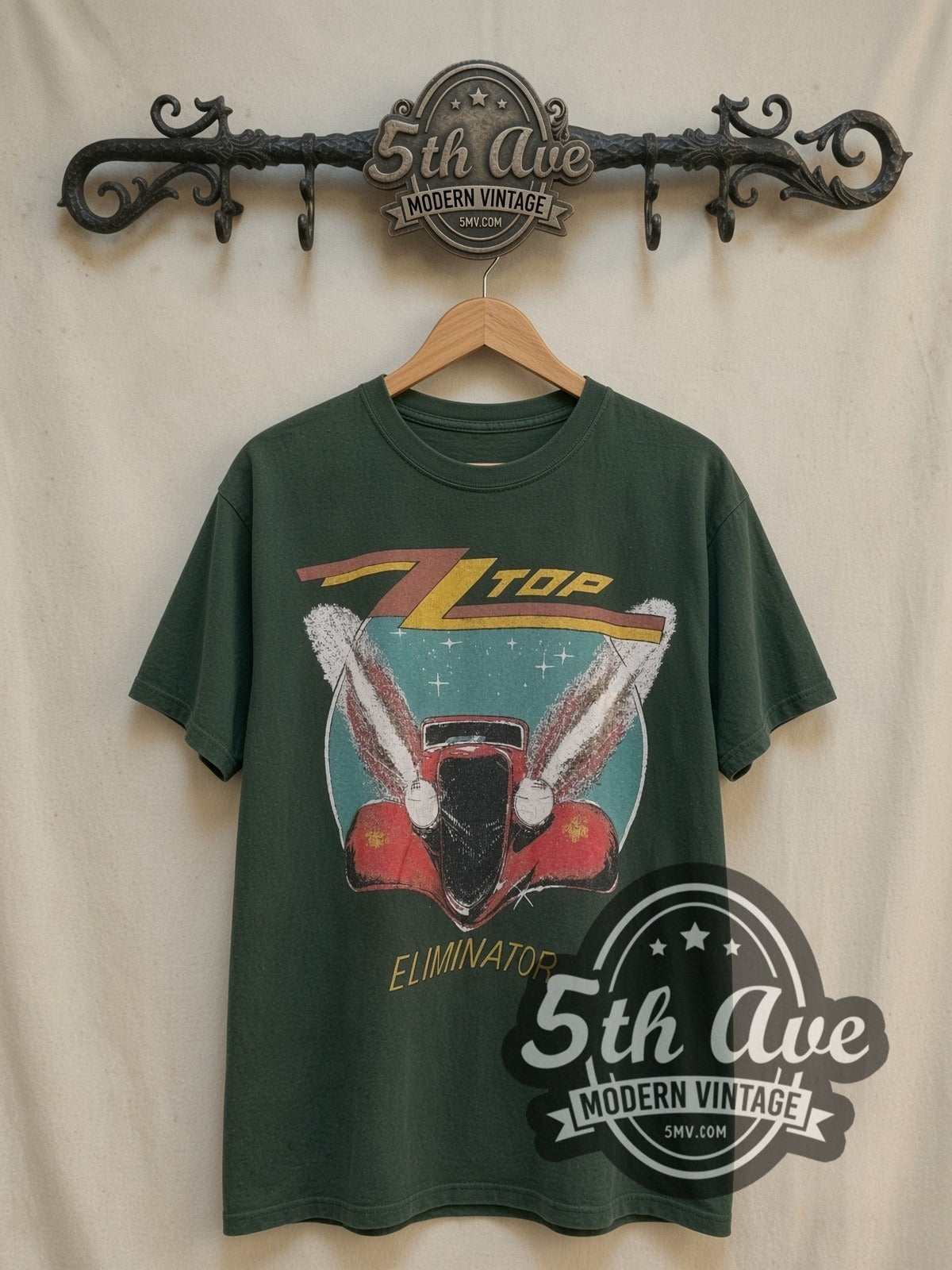 ZZ Top Eliminator Express 1983-84 vintage band t-shirt, front view on a display rack