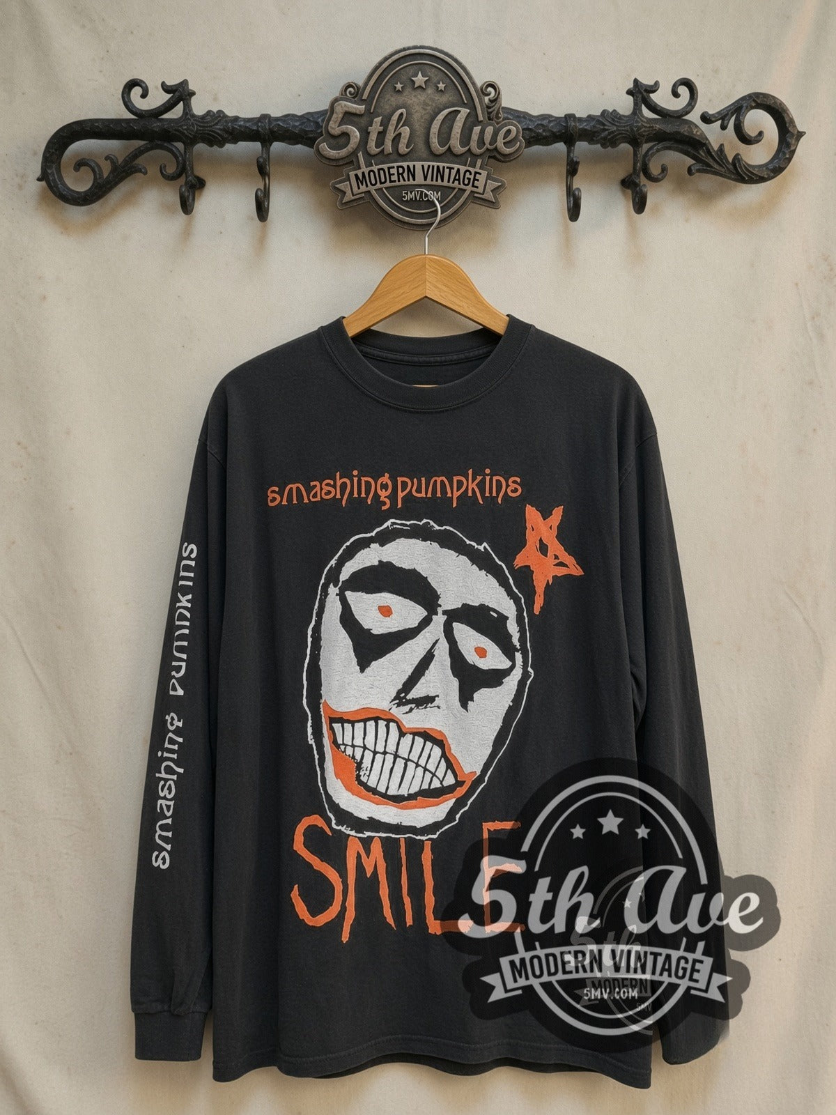 The Smashing Pumpkins Smile vintage band long sleeve t-shirt, front view on a display rack