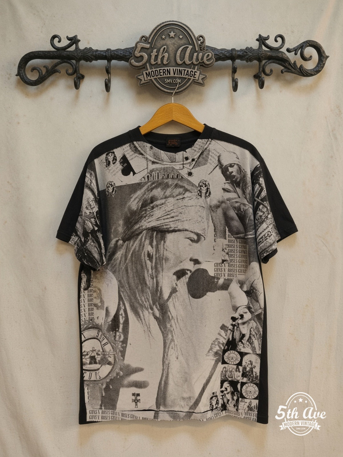 Guns N' Roses Axl Rose all-over-print vintage band t-shirt in black, front view on a display rack
