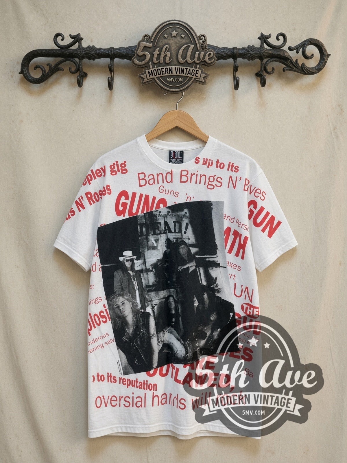 Guns N' Roses DEAD Newspaper Headlines all-over-print vintage band t-shirt in white, front view on a display rack