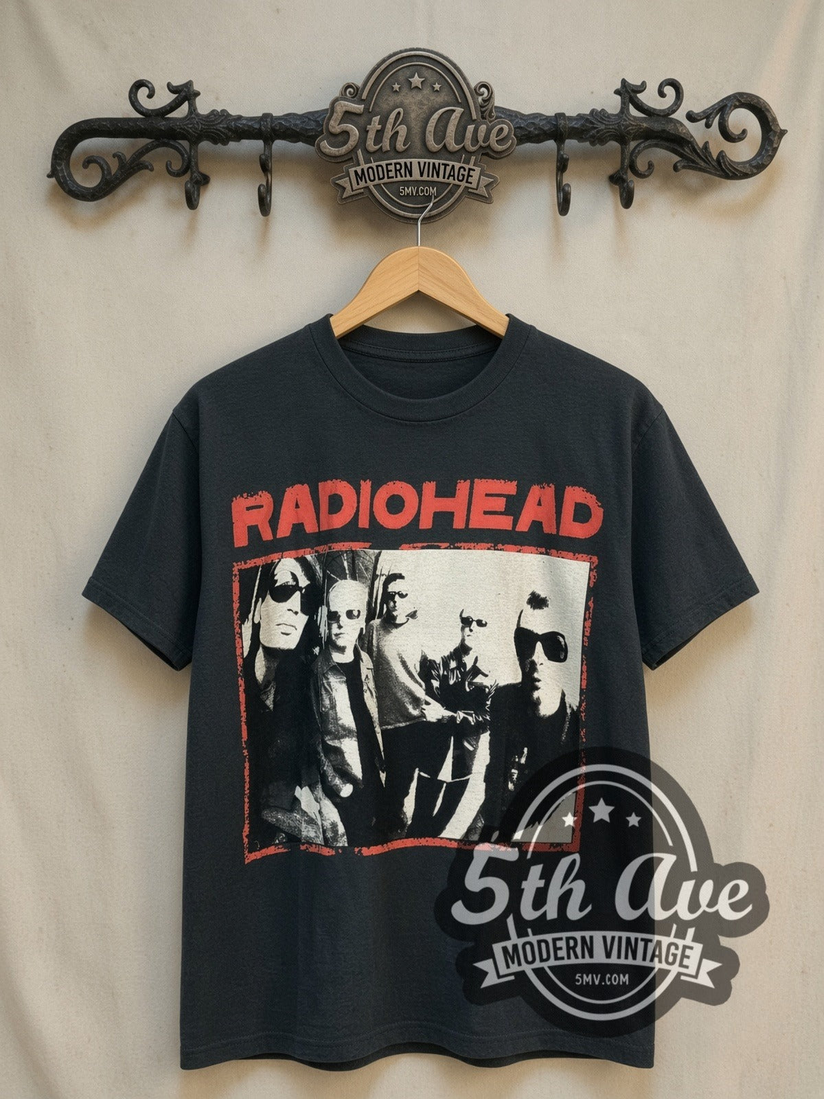Radiohead Sunglasses Band Photo Red Border vintage band t-shirt in black, front view on a display rack