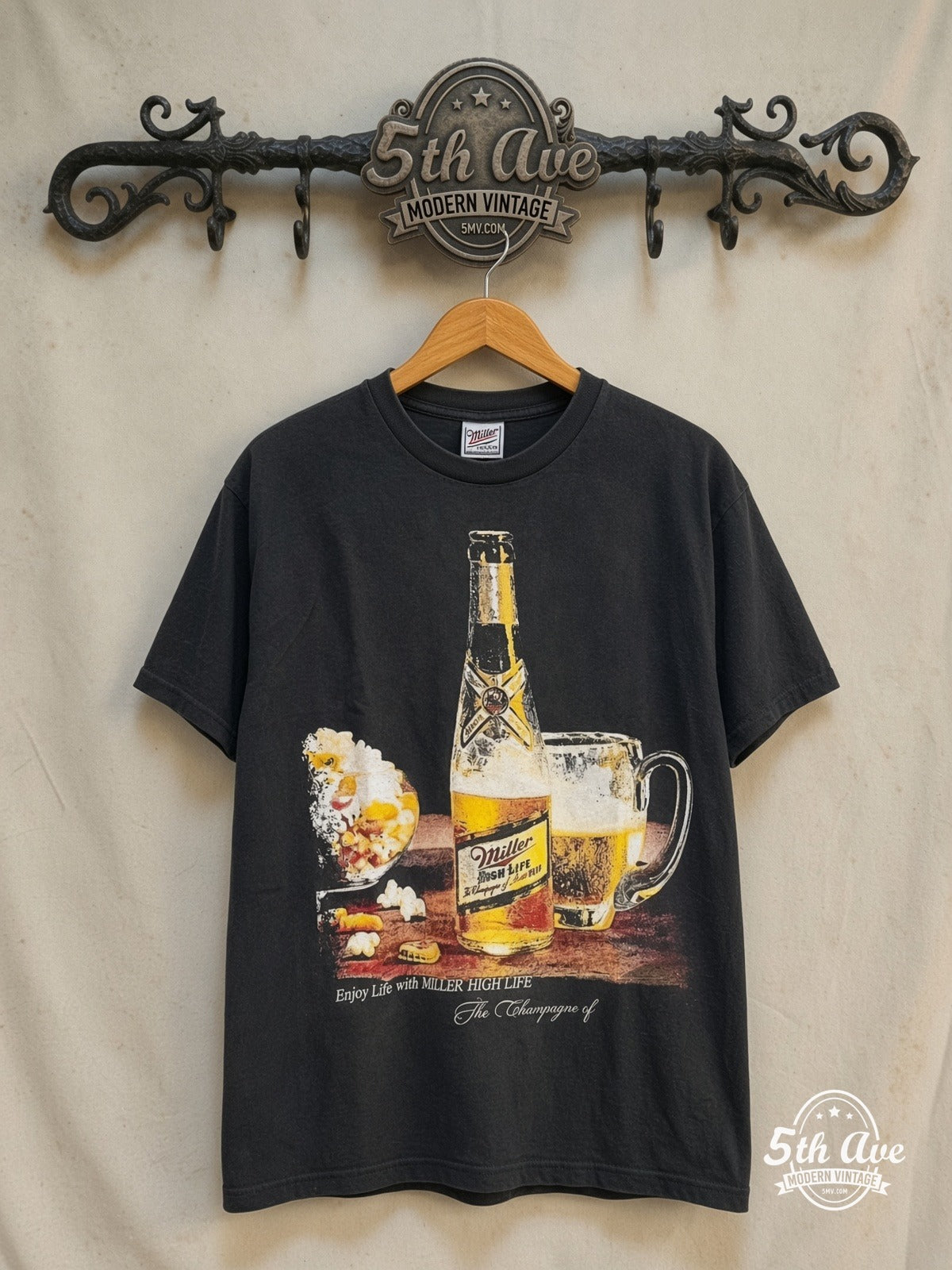 Miller High Life – Sparkling, Flavorful, Distinctive! – Vintage Graphic Tee — front on locked cream ornate 5th Ave rack