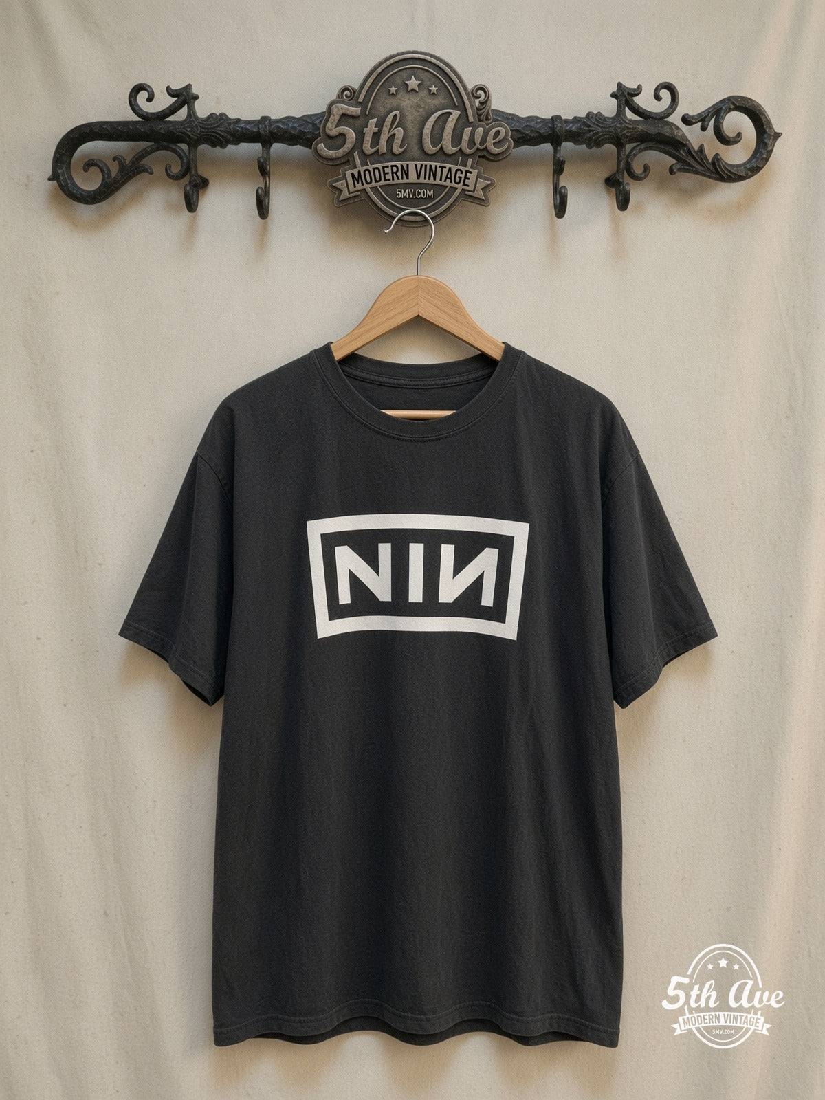 Nine Inch Nails – NIИ / NIN – Vintage Band T-Shirt — front on locked cream ornate 5th Ave rack