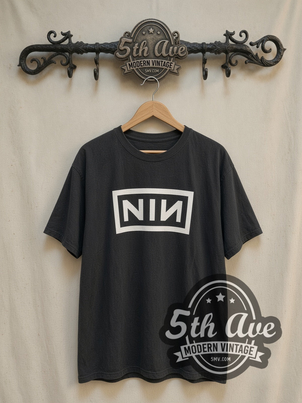 Nine Inch Nails NIИ / NIN vintage band t-shirt, front view on a display rack