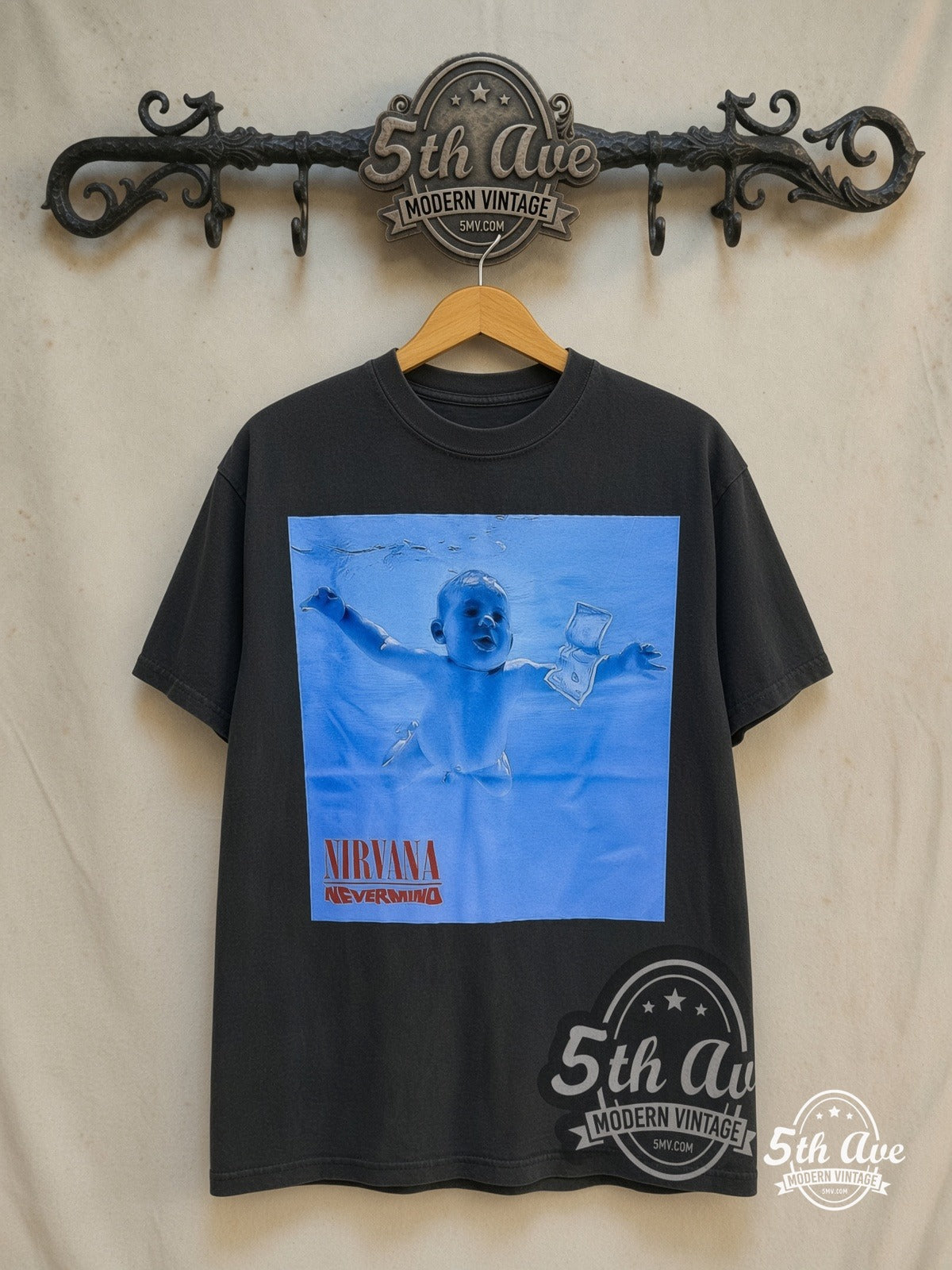 Nirvana – Nevermind Baby Underwater – Vintage Band T-Shirt — front on locked cream ornate 5th Ave rack
