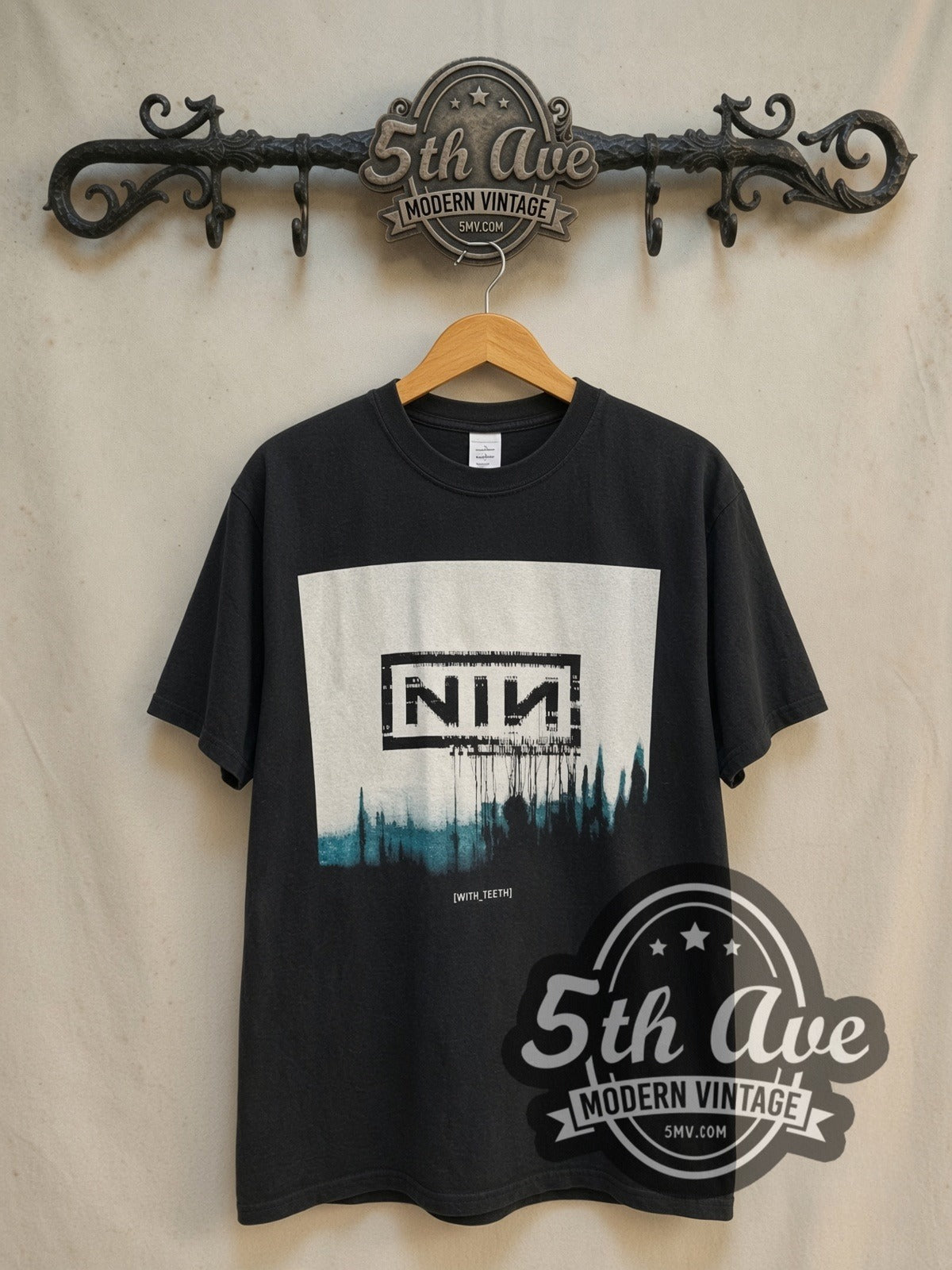 Nine Inch Nails NIИ 'With Teeth vintage band t-shirt in black, front view on a display rack