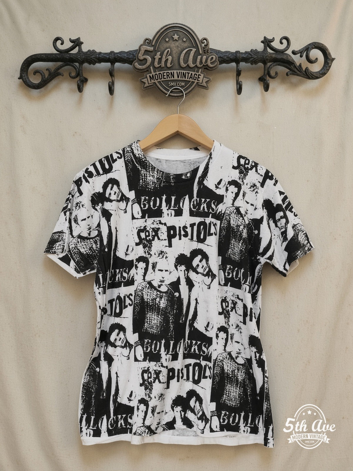 Sex Pistols Bollocks - AOP all over print New Vintage Band T-Shirt – Vintage Band T-Shirt — front on locked cream ornate 5th Ave rack