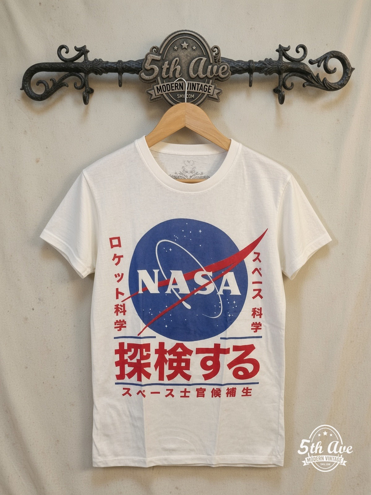 NASA Japanese Logo graphic tee in white, front view on a display rack